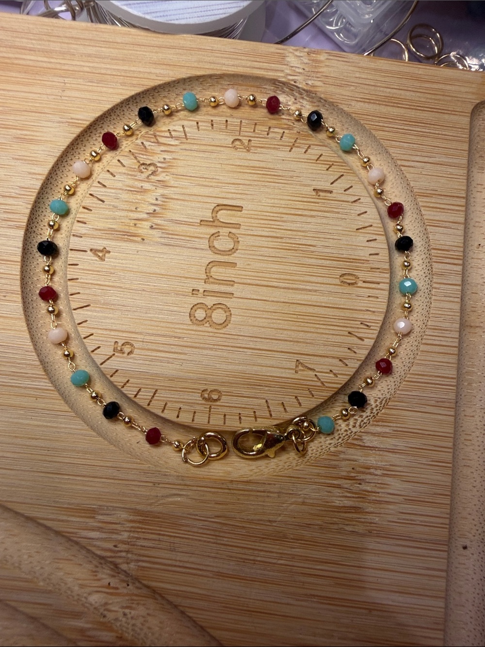 Gold Beaded Multicolor Bracelet with Red, Black, Turquoise & Cream Accents